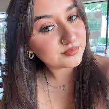 ISO a tattoo artist that can do a coverup behind the ear