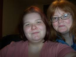 This is a beautiful photo of the late Carol Flynn Stambaugh, with daughter  Debbie (on her lap) and her sister Linda's daughters Stephanie and Lisa. (I  believe I mislabeled the kids earlier -