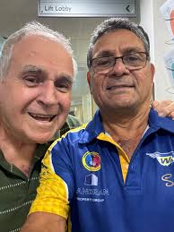 Who are the two rugby players who switched to rugby league and played for  the Roosters?