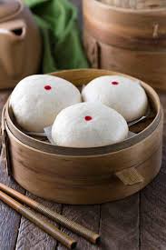 Chinese Steamed Custard Buns Also Called Nai Wong Bao Are Deliciously Sweet Dessert A Popular Asian Treat Found At In 2020 Custard Buns Chinese Dessert Asian Desserts