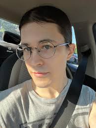 Shaving and plucking facial hair twice daily