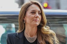 Kate Middleton Wore a Crossbody Bag with a Long Coat