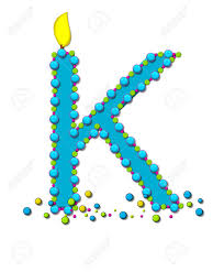 Alphabet and number cakes are now available at ferns n petals! The Letter K In The Alphabet Set Birthday Cake Candle Is Aqua And Outlined In Fun Colored Sprinkles Flame Burns From Top Of Letter More Sprinkles Surround Base Of Letter Stock Photo