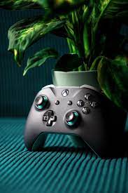 3.when it's displayed, press the menu button on your controller and select set as background. Black Xbox One Game Controller Photo Free Leipzig Zentrum Image On Unsplash