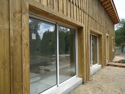 L Entreprise Deck 40 A Pose Un Bardage En Lames De Volige En Douglas Traite Autoclave Le Bardage E Maison Bois Bardage Bois Exterieur Bardage Exterieur Maison