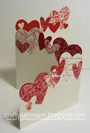 Then score each down the centre. Trifold Punched Hearts Card Valentines Cards Valentine Day Cards Cards Handmade