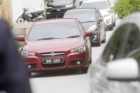 Najib, who is pekan mp, was seen leaving the residence in a toyota vellfire at 9.20 am and escorted by police vehicles. Arrested And Whisked Away In A Red Proton Najib To Spend Night In Lockup Today