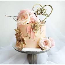 Smooth buttercream in pastel colours are swirled into a flush floral finish on chocolate sponge layers. Buttercream Floral Pastel Cupcake