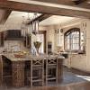 With natural materials and earthy colors foremost in the design palette, an old world style kitchen combines heavy proportions with luxurious attributes. 3