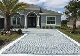 Stained concrete is available in a variety of rich colors that can add dimension and texture to your driveway. Concrete Stencils For Driveways Are Big Business Concrete Decor