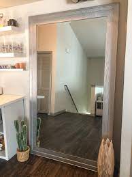 Now i'm using the same screwdriver to (gently) scrape off some of the remaining glue. Diy Modern Mirror Re Frame What Not To Do Kayla Simone Home
