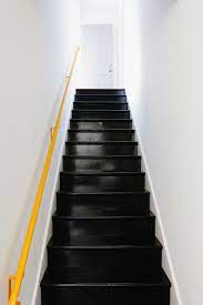 A New England Kitchen By Way Of La Remodelista Black Painted Stairs Staircase Design Black Stairs