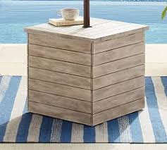 The rustless steel table top holds cups, plates. 1000 2500 Umbrellas Stands Pottery Barn