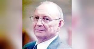 Glenard E. Schmid Obituary