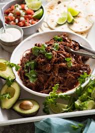 Discard any bits of gristle or fat remaining in the shredded meat. Mexican Shredded Beef And Tacos Recipetin Eats