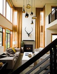 Spangle your ceiling with mini pendant lights for starlit ambiance. Pendant Light Fixtures For High Ceilings High Ceiling Living Room Living Room Pendant Living Room Pendant Light