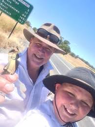 Meet the father and son walking from Adelaide to Canberra to help refugees 