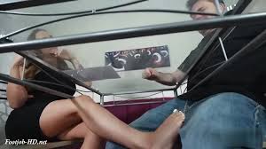 Footjob under desk - video 2 - ThisVid.com