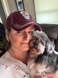 This photo of my first shih tzu Marley and I is my favorite. He lived to be  16.