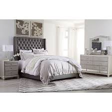 Coralayne king upholstered bed set allures with the glitz and glam befitting silver screen queens. Coralayne Bedroom Furniture Bedroom Furniture Ideas