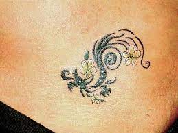 Dragon With Plumeria Flowers A Strong Meaning But A Small And Quite Feminine Take On It Small Dragon Tattoos Girly Tattoos Chest Tattoos For Women