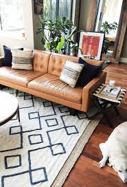 Buying a sofa is a big investment — daunting if you don't have a designer with an inspiration board at your investment piece should be versatile enough to go with a new house or a new decor scheme. 5 Ways To Style A Camel Leather Sofa Jaymee Srp
