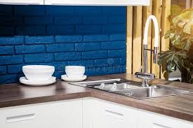 Wood and faux wood tiles, slats, sheets and panels are all used. 10 634 Kitchen Sink Wall Photos Free Royalty Free Stock Photos From Dreamstime