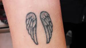 Small Angel Wing Tattoos On Wrist Small Wrist Tattoos Designs And Trendy Tattoos Meaningful Wrist Tattoos Tattoos