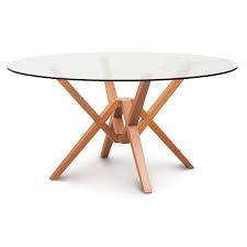 The manufacturer has added a tempered glass top so that it has minimal scratches. Exeter Round Dining Table Creative Classics