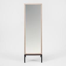 Frameless design with beveled edges surrounding the mirror creates linear interest. Mirrors Target