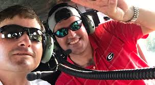Kevin Kisner, Georgia superfan, hires a helicopter to get to the game