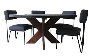 Coffee tables are a key component of any living space, offering a place to set drinks and snacks or display decor. Modern Round Metal Top X Base Dining Table Mortise Tenon