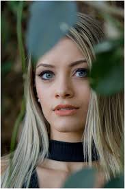 The Night Owl. Jana lies in bed, holding the pillow…