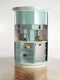 Taking up just 20 square feet, this circle kitchen promises to rotate up to 180 degrees to give you a sink, microwave, and dishwasher along with the same. A Circular Kitchen That Saves Space Portable Furniture Kitchen Design Small Interior Kitchen Small