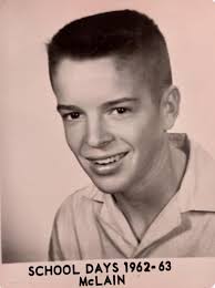 Found a photo of guys from McCurtain. Not sure what building is in the  background. Left to right: Jimmy Anderson, Raymond Lane, Albert Davis.  Probably taken in the early 1960's.