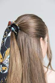 A bonus of putting the scrunchie on last is that it helps hold loose hairs down. Hair Scarf Scrunchie 4 Easy Ways To Style Its Lauren Victoria