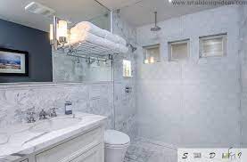 Photo of a classic bathroom in london with shaker cabinets, white cabinets, a freestanding bath, an this ensuite bathroom was designed for a teenage boy with crackle glaze brick tiles in a soft. Classic Bathroom Design Ideas