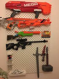 Mount the pegboard to the wall with mounting screws or hook the nerf gun's handle or trigger along the bottom of the s hook to hold it in place on the rack.5 x. My Little Boy S Gun Rack Nerf