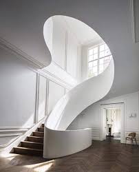 The Staircase Shows A Prime Example Of Curved Lines As The Lines Are Curved Minimalist House Design Minimalist Interior Design Stairs Design