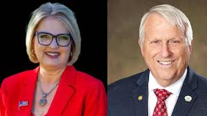 Apopka Mayor Bryan Nelson, who is running for reelection, is suing an  opponent, Orange County Commissioner Christine Moore, to get her taken off  the ballot, accusing her of violating the city's residency