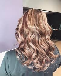 Blonde streaks in dark hair add contrast and interest without the commitment. 5 Things You Need To Know About Getting Lowlights All Things Hair Uk