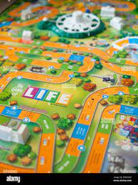 A View Of The Game Of Life (Also Known As Life), A Board Game Originally  Created In 1860 By Milton Bradley Stock Photo - Alamy
