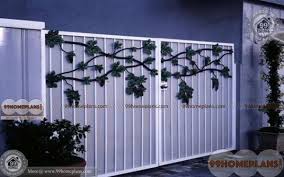 The random slants of the spokes add a quirky touch to the perfect symmetry of the modern design. Entrance Gate Design Home Interior Iron Gate Design House Gate Design Entrance Design