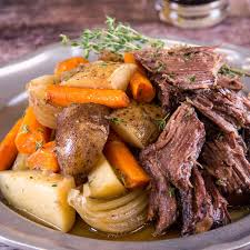 In a medium size bowl, mix soups (can and dried) and water and pour mixture evenly over roast. Slow Cooker Beef Pot Roast Hamiltonbeach Com