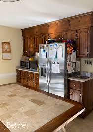 First off, use a piece of sandpaper to the will help smooth out the texture of the pine, ultimately making it easier for your primer and paint to adhere. How To Paint Pine Cabinets Confessions Of A Serial Do It Yourselfer