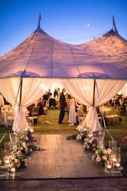 Walkway Of Candle Light And Flowers Leading Guests To Dinner Outdoor Tent Wedding Wedding Tent Lighting Tent Wedding Reception