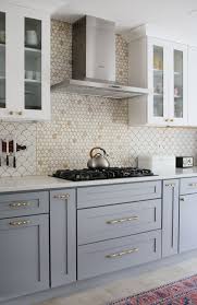 Modern Gray And White Kitchen With Wallpaper And Two Toned Cabinets Kitchen Design Small Kitchen Interior Kitchen Design
