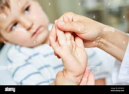 Chiropractic child hi-res stock photography and images