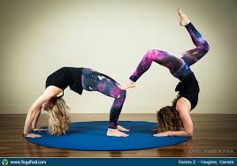 This yoga pose for 2 people stretches the hamstrings and lower back, while also working benefits: Pin On Yoga Partner