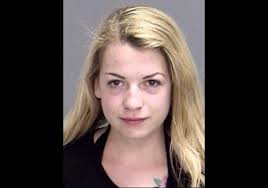 Police: Drunk woman hit parked cop car while taking topless selfie